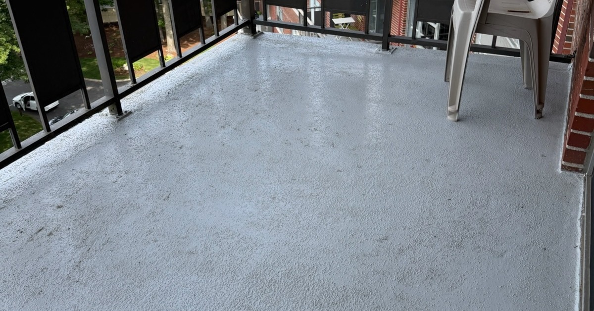 Move-out cleaning in Brookline — apartment balcony floor scrubbed clean before turnover